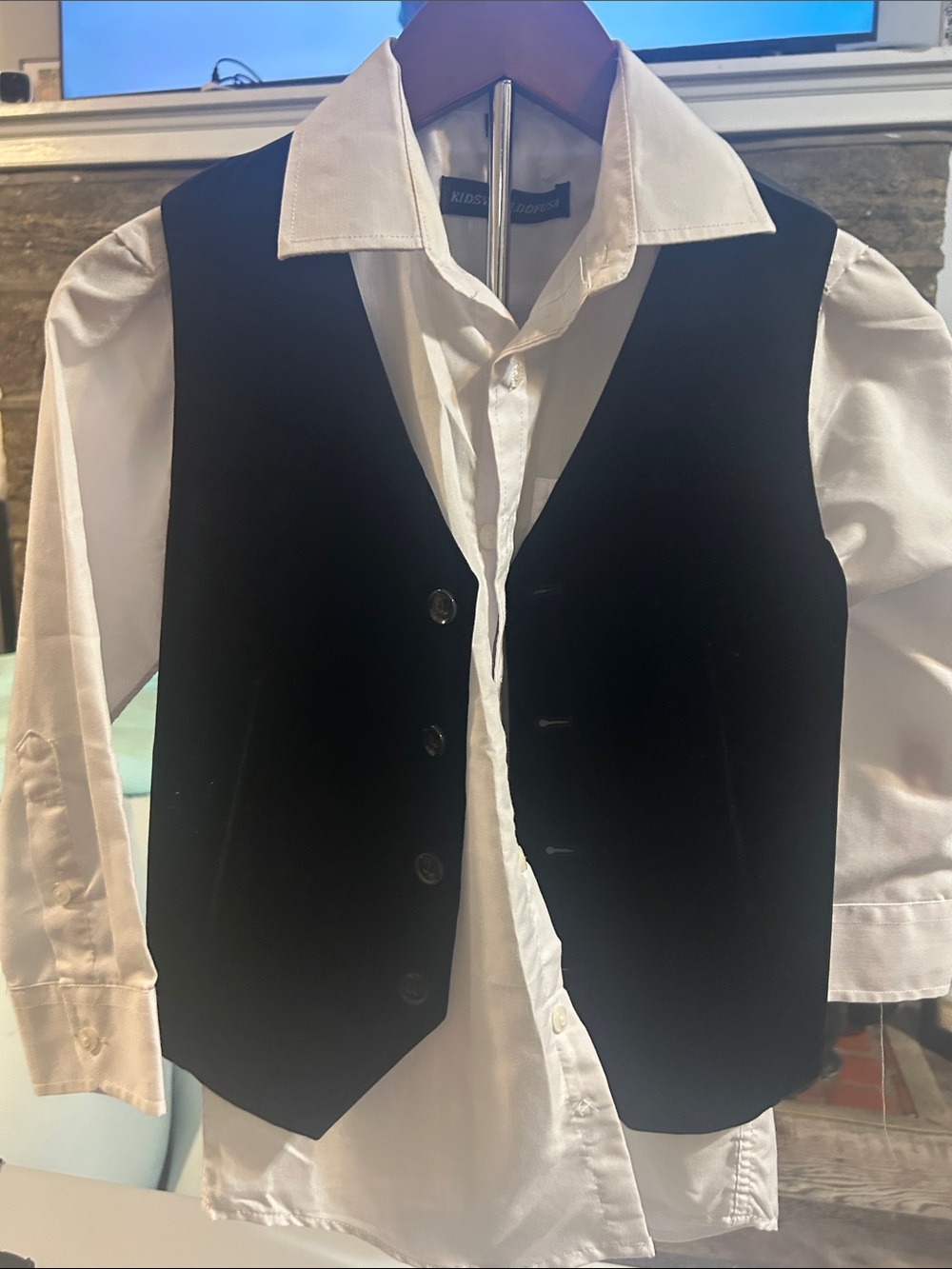 Black Vest with White Button-Down Shirt